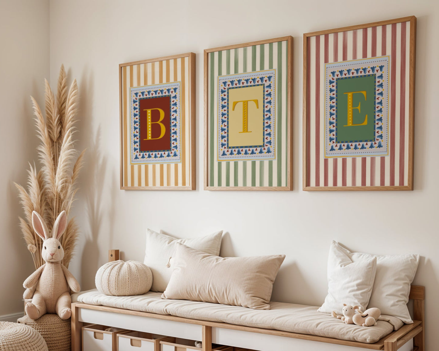 Decorative and unique alphabet wall art featuring your chosen letter in a bold yellow font on a deep red background, framed with a floral block-print style border and set against vertical muted yellow stripes—ideal for playful nursery decor, alphabet print collections, and unique gift ideas for children’s playrooms and nursery decor as well as design lovers